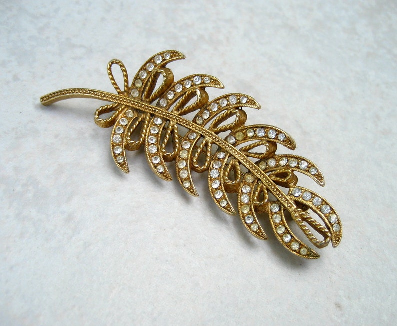 Vintage HAR Rhinestone Brooch Gold Tone Feather Bows image 1