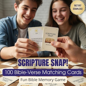May include: A card game called "Scripture Snap!" is displayed, featuring two people holding cards. The cards have text and illustrations, including an open book and Bible verses. The game is advertised as having 100 Bible-verse matching cards and is a fun Bible memory game.