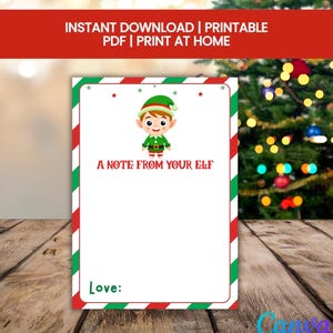 May include: A printable Christmas card with a cartoon elf illustration. The card has a red and green striped border and includes the text "A NOTE FROM YOUR ELF" and "Love:" at the bottom. The top banner reads "INSTANT DOWNLOAD | PRINTABLE PDF | PRINT AT HOME".