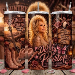 May include: A cylindrical tumbler with a metal straw featuring a portrait of Dolly Parton, a guitar, cowboy boots, a hat, roses, a butterfly, and a cow skull. Text includes Country Roads Take Me Home, Here You Come Again, I Will Always Love You, Coat of Many Colors, and Dolly Parton.