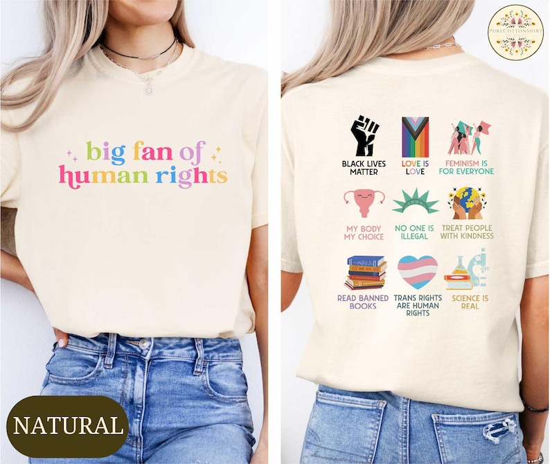 May include: Cream-colored t-shirt with the text "big fan of human rights" in rainbow colors. The back of the shirt features various graphics and phrases, including "Black Lives Matter" and "Love is Love."