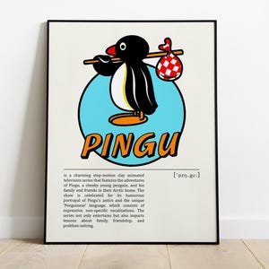 Puede incluir: Un póster enmarcado con el personaje de dibujos animados Pingu. Pingu, un pingüino blanco y negro con pico y patas naranjas, está sobre un círculo azul claro. La palabra "PINGU" está escrita en letras naranjas y negras.
