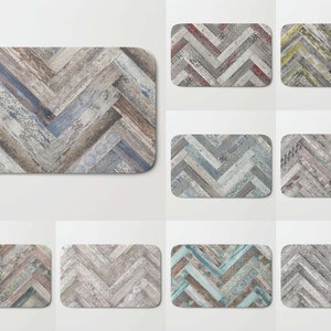 May include: A set of ten bath mats featuring a herringbone pattern in various colors and designs. The mats are made of a soft, absorbent material and are perfect for adding a touch of style to any bathroom.