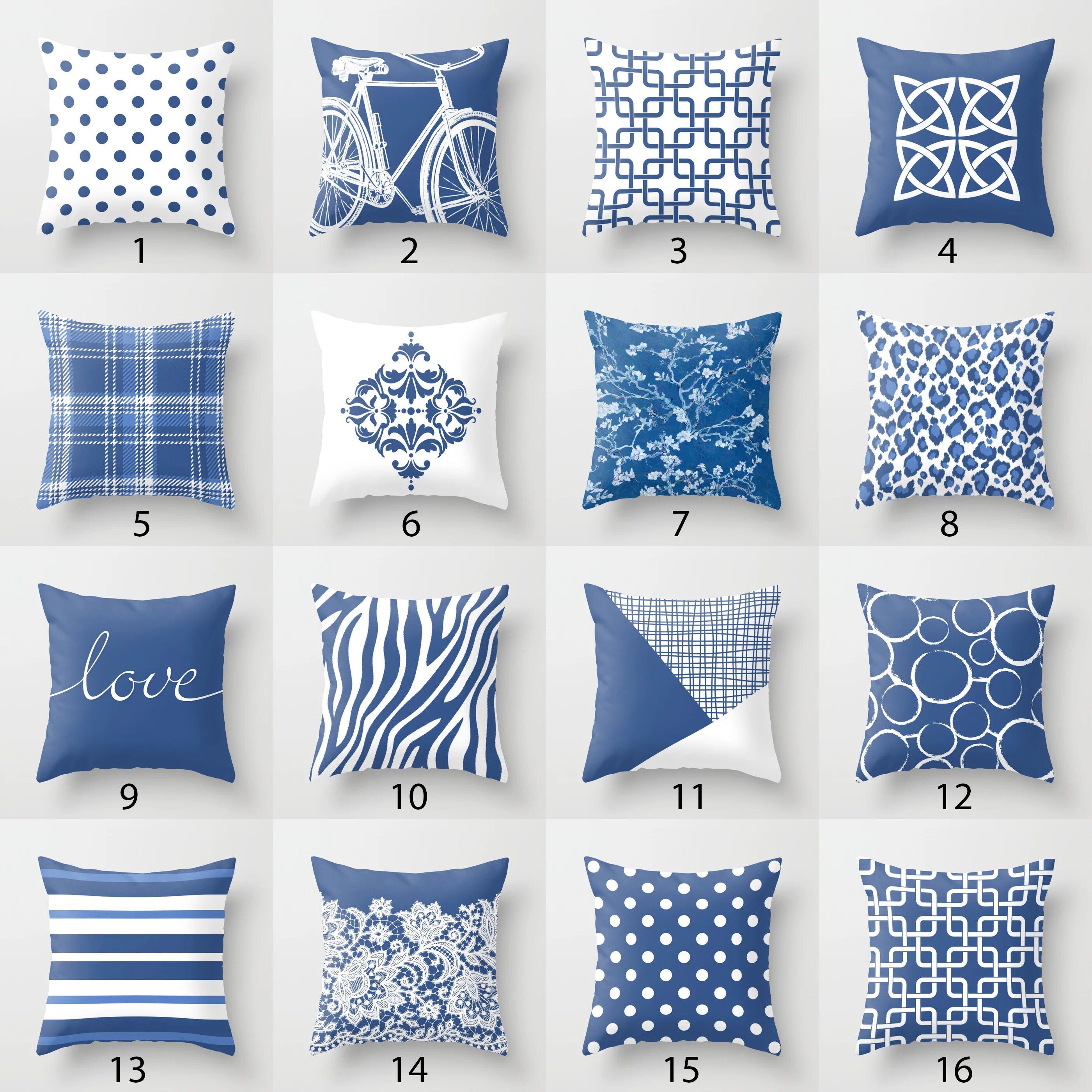 WHite and blue pillows accent a white linen couch placed in a