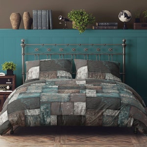 May include: A teal blue bedroom with a metal bed frame and a patchwork quilt. The quilt has a brown, gray, and blue color scheme. The bed is against a teal blue wall with a shelf above it. The shelf has books, a telescope, a globe, and a potted plant.