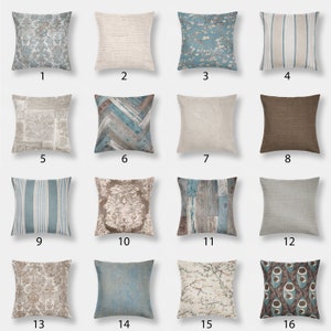 May include: A set of 16 decorative throw pillow covers featuring various patterns and colors, including blue, brown, beige, and white. The patterns include stripes, wood grain, floral, and damask.