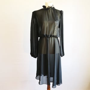 Vintage 70s sheer black ruffled collar dress- 1970s Sue Brett elastic waist flowing mid length dress-medium