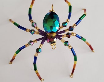 Beaded Christmas Spider / Pride Ornament/ Christmas Spider Legend/Christmas Ornament/ Christmas Décor/ Hallowe’en ~ Oval Rainbow Spider