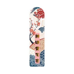May include: A decorative bookmark with a Japanese-inspired design. The bookmark features a pink, gold, red, and blue color scheme with cherry blossom and wave patterns. The text "God is love" is printed vertically in gold.