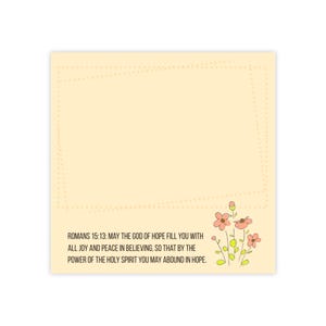 May include: A light yellow square card with a dotted border and a floral illustration. The text reads: Romans 15:13: May the God of hope fill you with all joy and peace in believing, so that by the power of the Holy Spirit you may abound in hope.