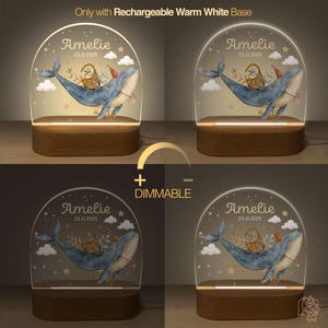 The image is a collage of four images, each featuring a wooden base with a clear glass display containing a blue whale and a moon. The display has a white base and is illuminated by a warm white light. The images are arranged in a grid format, with each row containing one image. The text "Amelie" is visible in each image, indicating the name of the whale or moon.