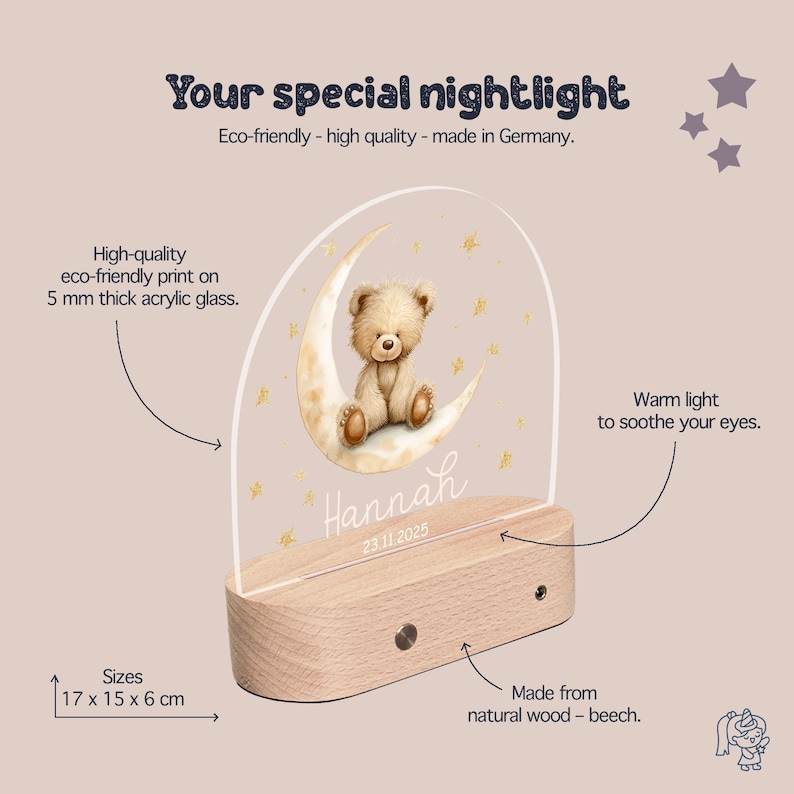 The image is a product description for a teddy bear-themed nightlight. It features a wooden base, a clear acrylic glass dome, and a crescent moon with a teddy bear on it. The nightlight is described as eco-friendly, high-quality, and made in Germany. The product is designed to provide a warm light to soothe eyes, and it is available in sizes of 17 x 15 x 6 cm. The nightlight is made from natural wood and beech.