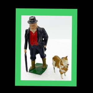 Metal diecast Vintage Miniature figures. Squire & Dog