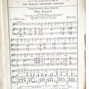 May include: A vintage sheet music score for a song titled "Who Knows?" by Paul Lawrence Dunbar. The song is described as a "Ball Ballad" and is set to a larghetto tempo. The sheet music includes musical notation and lyrics.