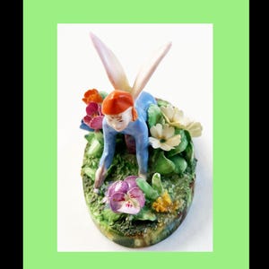Staffordshire Antique Fairy in Garden Figurine