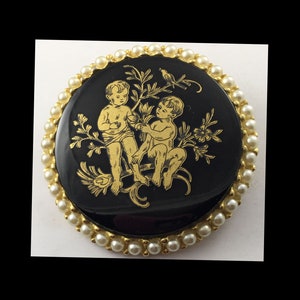 Vintage  Hobe  Circle brooch with seed pearls and Children in Garden Signed