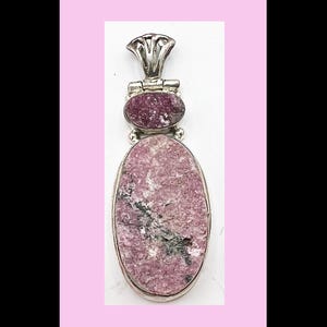 Pendant of Cobalt Calcite Rose Matrix, set in sterling silver.
