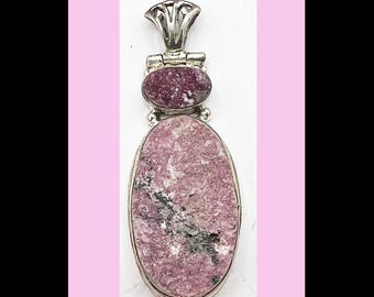 Pendant of Cobalt Calcite Rose Matrix, set in sterling silver.