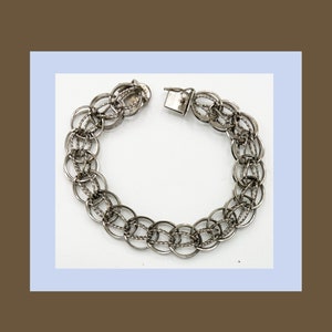 Charm Bracelet Vintage Sterling Silver Fancy Link 7 3/4 inches. F.A. Hermann