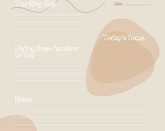 May include: A beige-colored journal page with the text "Thanking God," "I bring these burdens to You," and "Notes." The page includes a section for "Today's focus" and a quote from Matthew 6:33. The design features abstract shapes.