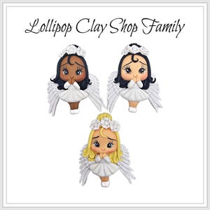 May include: Three clay angel figurines with different skin tones and hair colors. Each angel wears a white dress, a floral crown, and has white wings. The text "Lollipop Clay Shop Family" is at the top.
