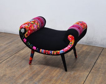 Puf sonriente - cisne negro