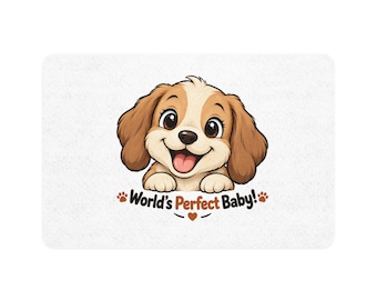 May include: A rectangular white mat featuring a cartoon illustration of a brown and white puppy with large eyes and a smiling mouth. Below the puppy, the text reads World's Perfect Baby! in brown letters, flanked by two small brown paw prints.