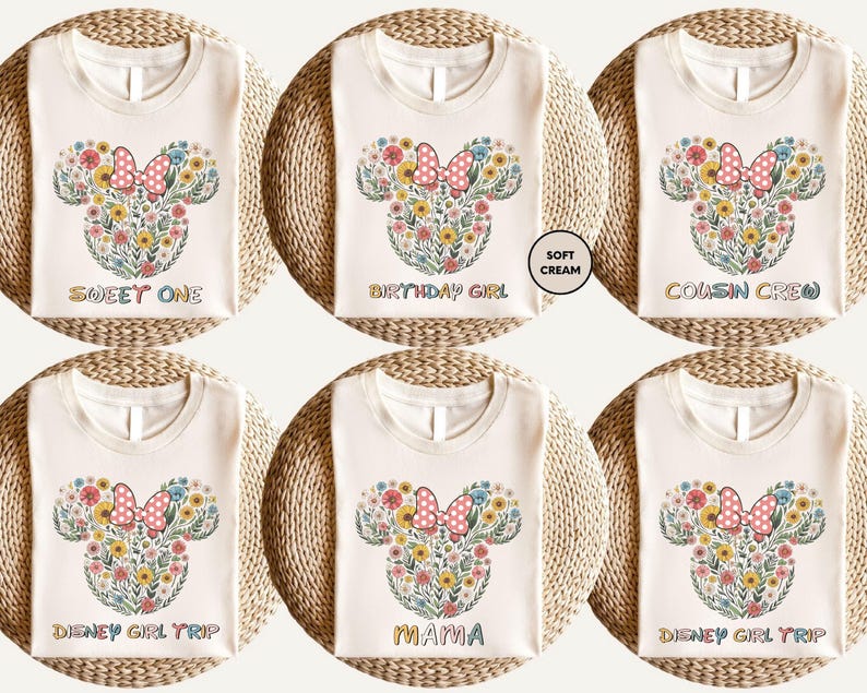 The image is a collage of six white t-shirts with a floral design and text printed on them.