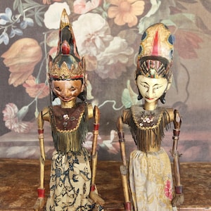 Pair of vintage Indonesian Wayang Golek traditional wooden rod puppets circa mid 1900s
