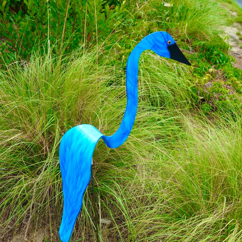 Swirling Bird bright Caribbean Blue Handpainted designs. Our Etsy
