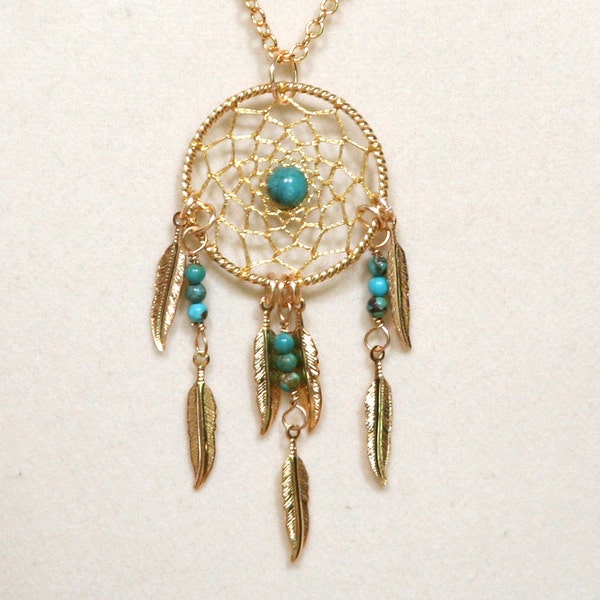 Collier attrape-rêves turquoise et or avec plumes