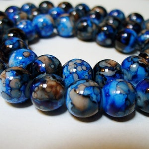 Perles de verre bleues, brunes et noires 10 mm
