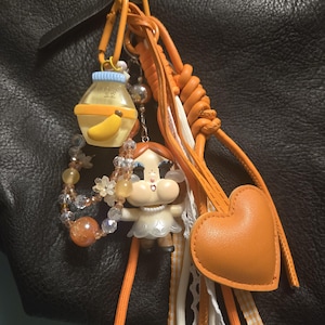 Cry Baby Keychain: Orange Puffy Heart, Beads, Knotted Ribbons & Cords