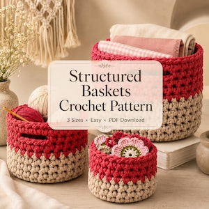 May include: Three round crochet baskets in red and beige with integrated handles. The text Structured Baskets Crochet Pattern 3 Sizes Easy PDF Download is overlaid. The baskets contain yarn balls and small crocheted flower motifs.