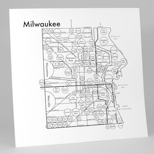 May include: A black and white map of Milwaukee, Wisconsin, showing the city's neighborhoods and parks. The map is labeled with the names of the neighborhoods and parks, and the city's name is at the top of the map.