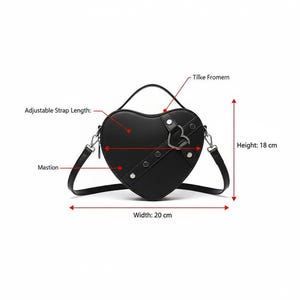 May include: Black heart-shaped handbag with an adjustable strap. The bag has a top handle and a silver-colored metal clasp. The bag is 20 cm wide and 18 cm high.