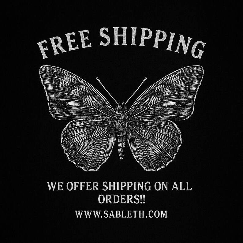 May include: Black graphic with a detailed butterfly illustration. The butterfly is centered, with the words "FREE SHIPPING" above and text below that reads "WE OFFER SHIPPING ON ALL ORDERS!!" and "WWW.SABLETH.COM".