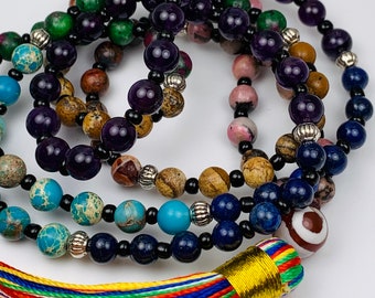 Designer exclusive unique jewelry. Beryl AAA beads elastic bracelet with silk tassel and heart matte bead