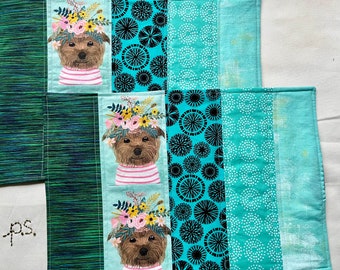 Sweet Brown Dog in Crown of Flowers and Striped Clothes vs Green Paisley Placemats - Reversible Dogs Quilted Placemat Pair