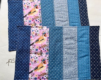 Floral Goldfinch on Pink with Scrappy Blue Fabrics vs Winter Christmas Scene Placemats - Reversible Quilted Placemat Pair