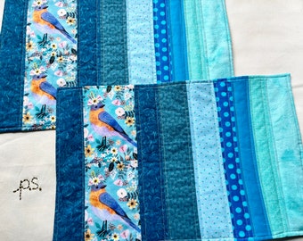 Floral Bluebird and Aqua and Blue Fabrics vs Green Paisley Placemats - Reversible Quilted Placemat Pair