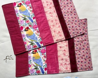 Floral Blue and Yellow Bird with Scrappy Rose Fabrics vs Dark Rose Paisley Placemats - Reversible Quilted Placemat Pair