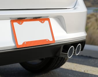 Marco de matrícula metálico con franjas naranjas / Borde delgado de acero inoxidable