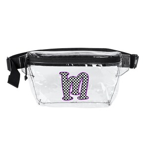May include: Clear fanny pack with a black zipper and strap. The pack features a purple and black checkered letter "m" on the front. The strap is adjustable and the pack is made of a clear, see-through material.