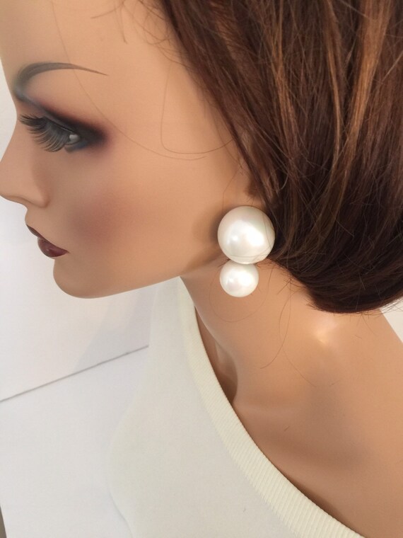 pearl earrings on ear