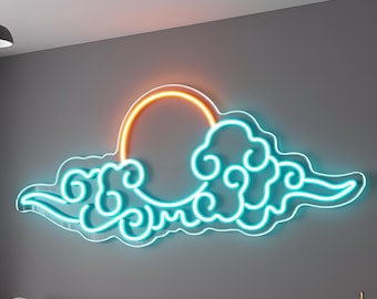 May include: A neon cloud and sun wall art piece. The cloud is outlined in bright turquoise, with an orange sun in the center. The art is mounted on a gray wall, above a white couch.