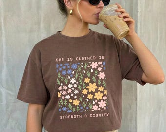 Boho Christian Floral Shirt Women Comfort Colors Shirt Bible Verse Shirt She Is Clothed In Strength And Dignity Christian Faith Apparel