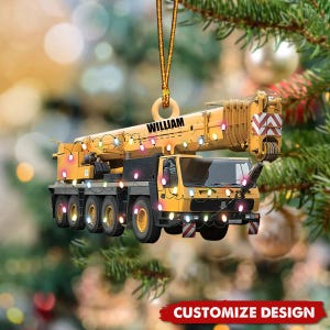 May include: Yellow crane truck Christmas ornament with the name "WILLIAM" and string lights. The ornament has a wooden ring for hanging and the words "CUSTOMIZE DESIGN" at the bottom.