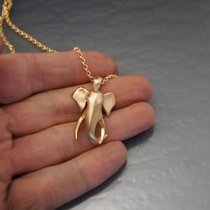 bull elephant,  bronze. 14 k gold fill chain