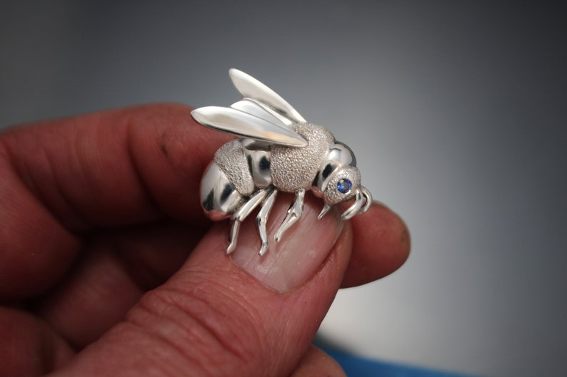 silver bee pin / pendant with blue sapphire eye image 2